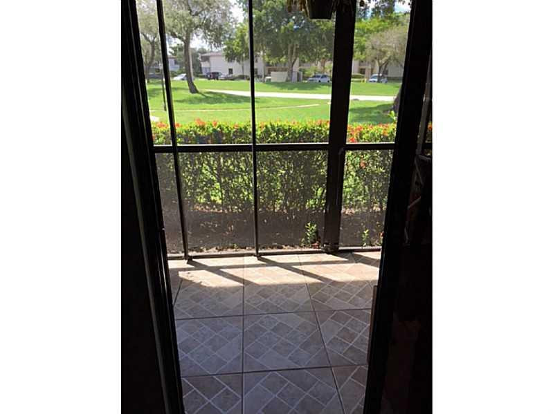 9749 West McNab Road, Unit 111 Tamarac, FL 33321 - Photo 6 of 10 Patio/Deck.
