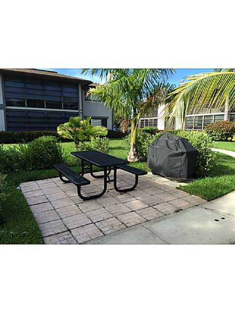 9749 West McNab Road, Unit 111 Tamarac, FL 33321 - Photo 9 of 10 Exterior Back.