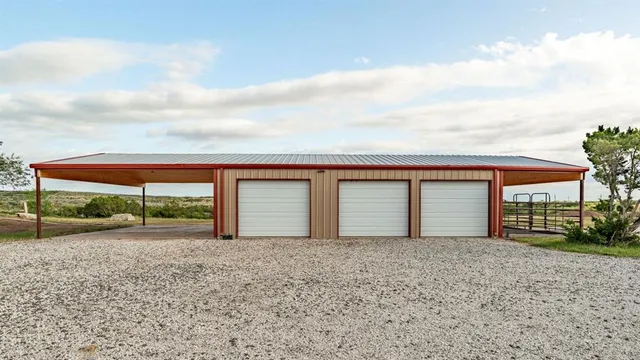 a view of parking garage with cars