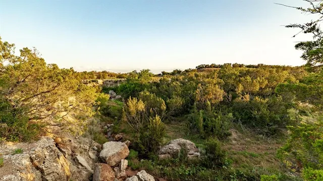 a view of swimming pool of water and mountain view