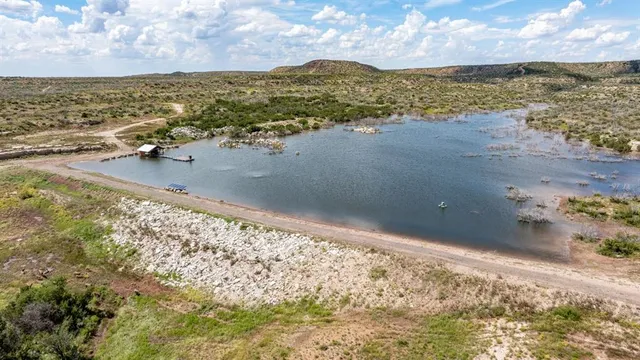 a view of a lake with a outdoor space