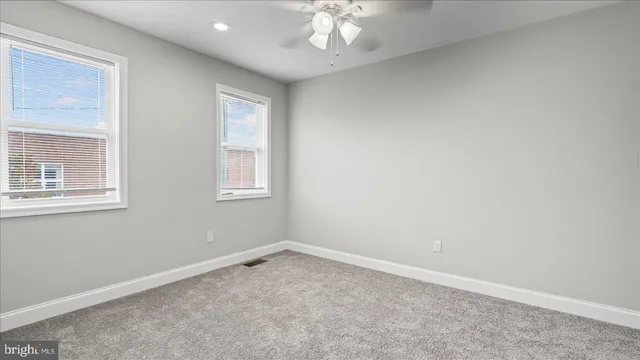 en empty room with windows