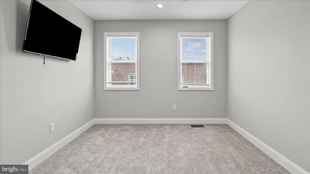 a view of livingroom with a flat screen tv