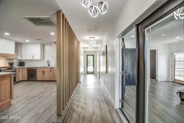 a view of a kitchen cabinets and wooden floor