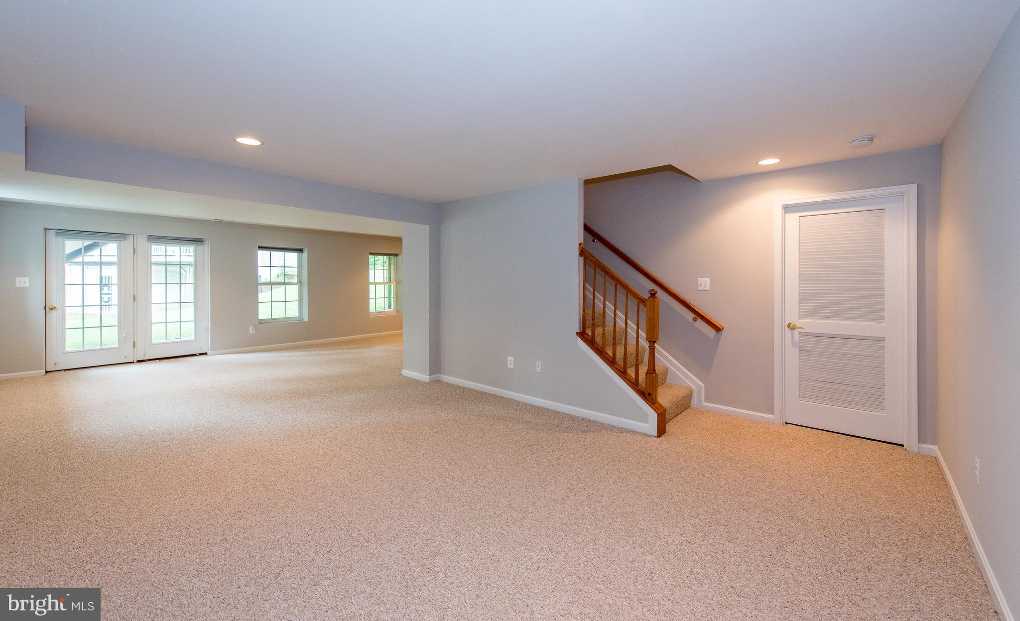 8043 High Castle Road Ellicott City, MD 21043 - Photo 24 of 28 Basement w/french doors leading to back yard