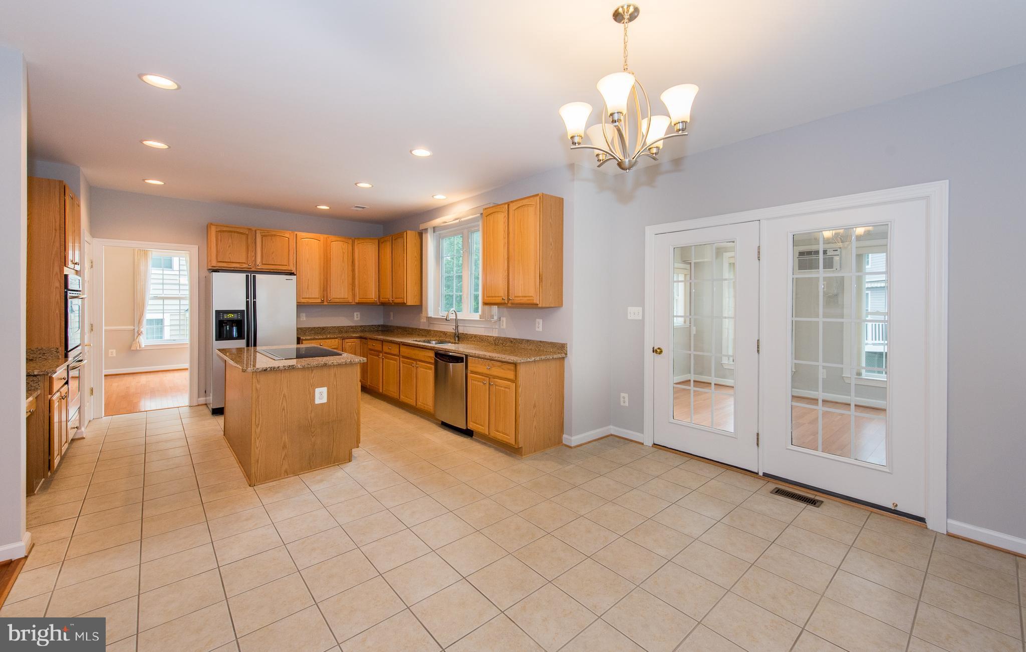 8043 High Castle Road Ellicott City, MD 21043 - Photo 8 of 28 Kitchen/Breakfast Area w/French Doors