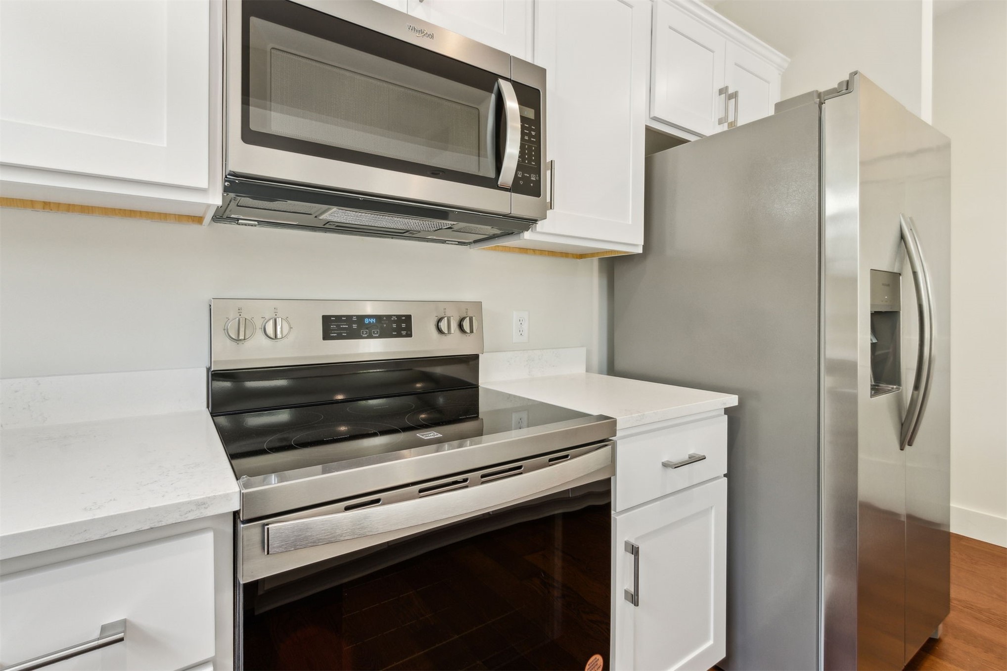 929 South 9th Street Fernandina Beach, FL 32034 - Photo 16 of 36 a kitchen with stainless steel appliances a stove microwave and refrigerator