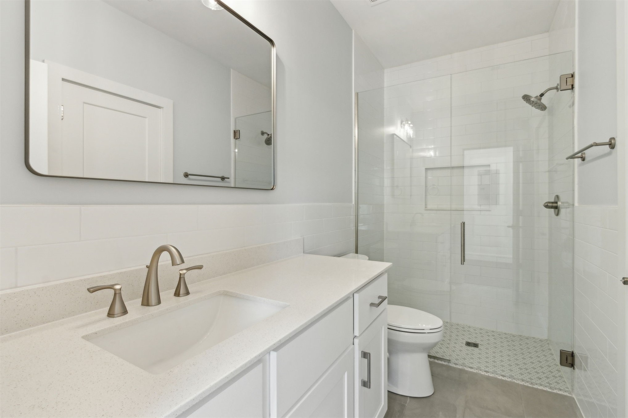 929 South 9th Street Fernandina Beach, FL 32034 - Photo 23 of 36 a bathroom with a sink toilet and shower