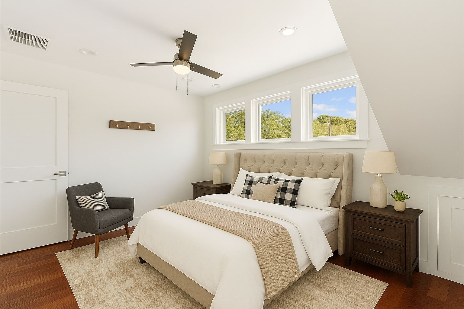 929 South 9th Street Fernandina Beach, FL 32034 - Photo 25 of 36 a bedroom with a bed and wooden floor