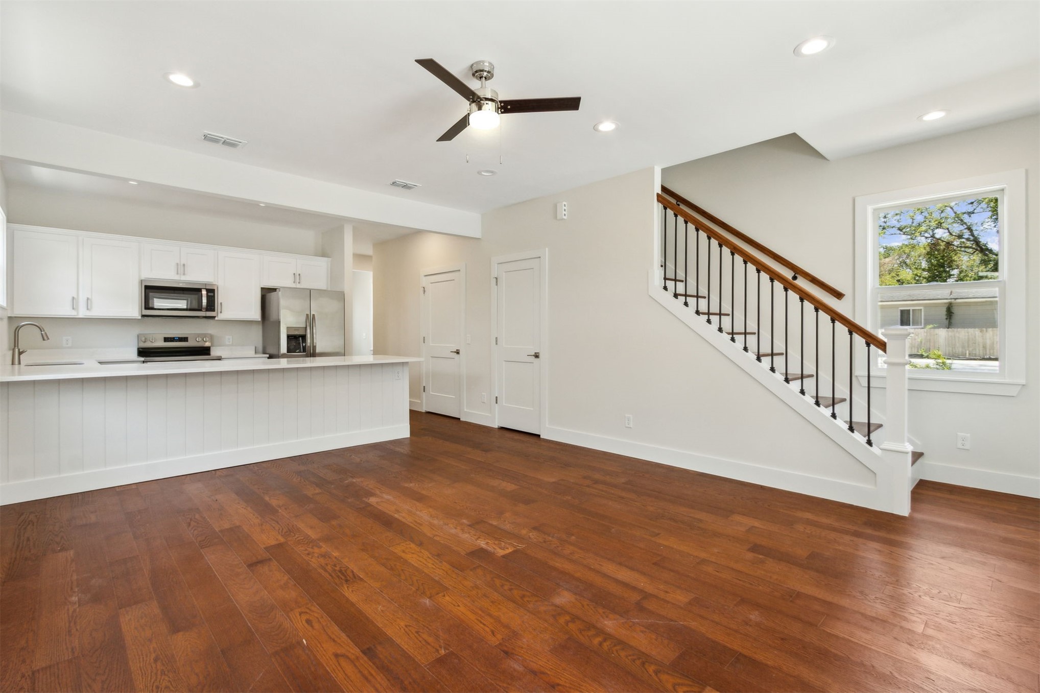 929 South 9th Street Fernandina Beach, FL 32034 - Photo 9 of 36 a view of kitchen with microwave and cabinets