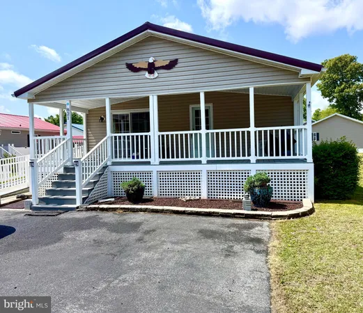 front view of a house with a small yard