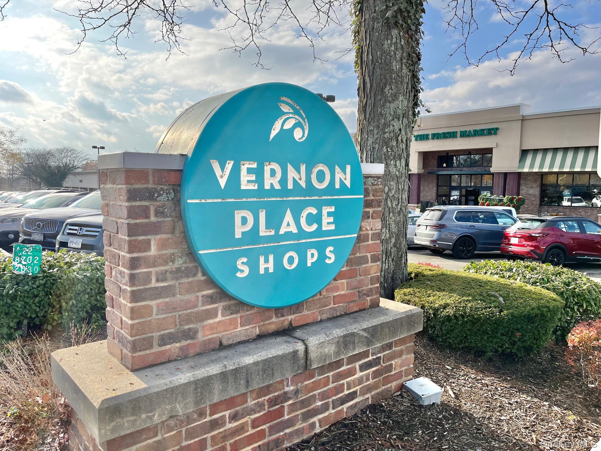 153 Montgomery Avenue, Unit B Scarsdale, NY 10583 - Photo 13 of 14 a sign that is sitting on a brick wall