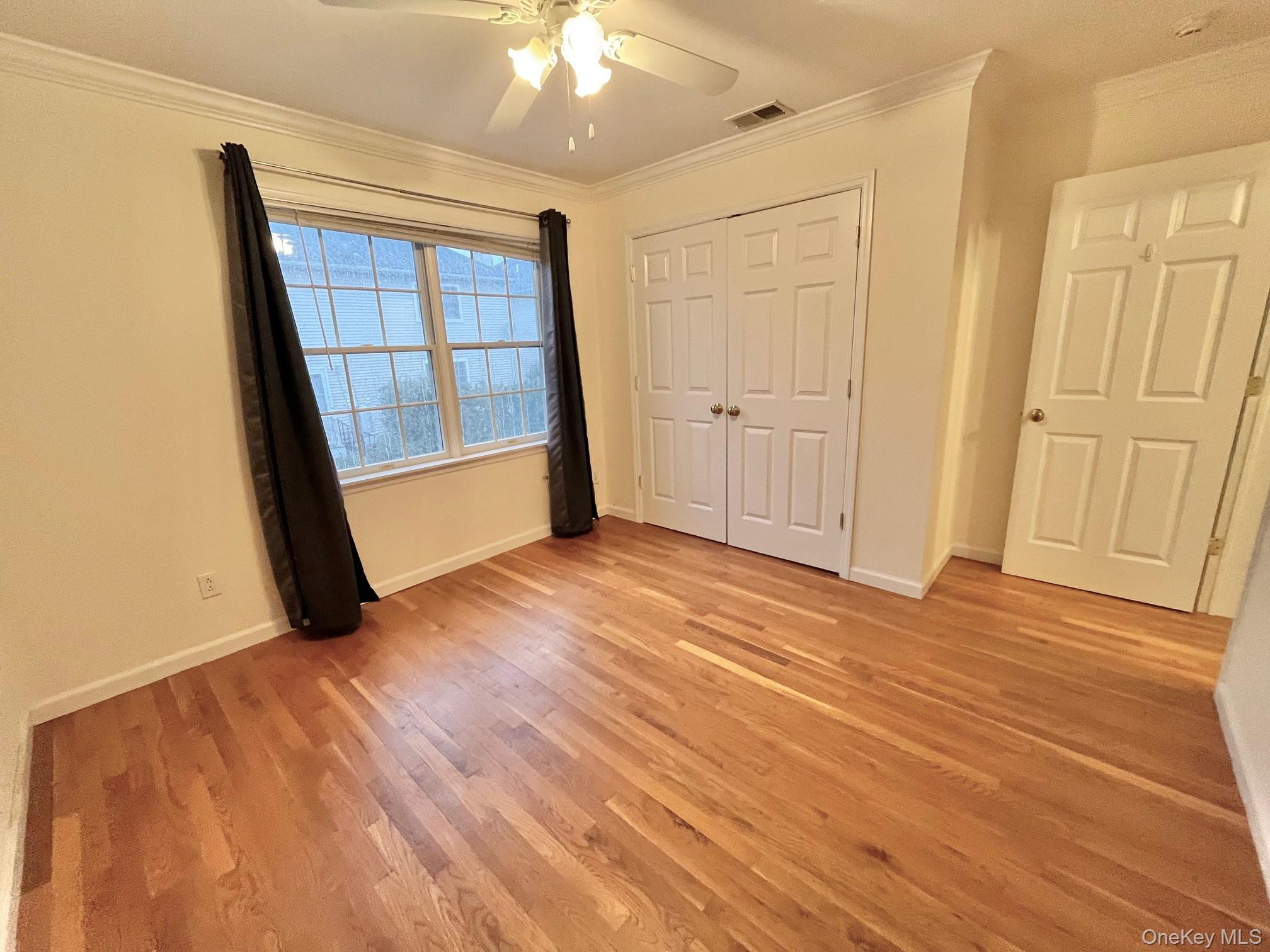 153 Montgomery Avenue, Unit B Scarsdale, NY 10583 - Photo 6 of 14 a view of an empty room with a window