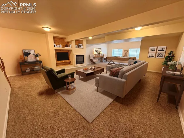 a living room with a fireplace