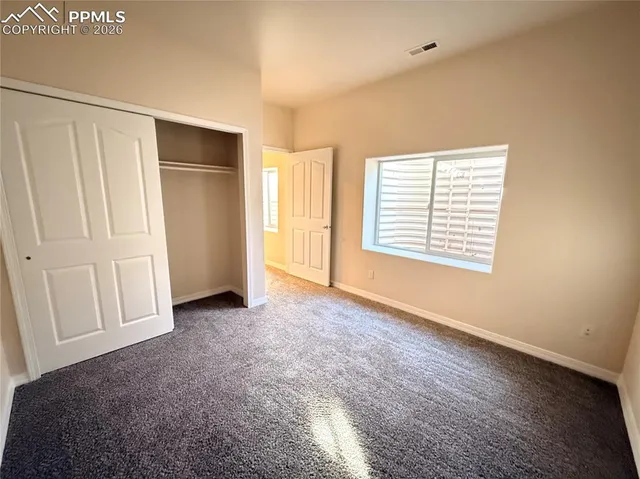 an empty room with closet