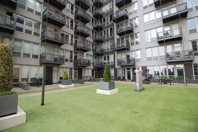 a view of large building with a yard