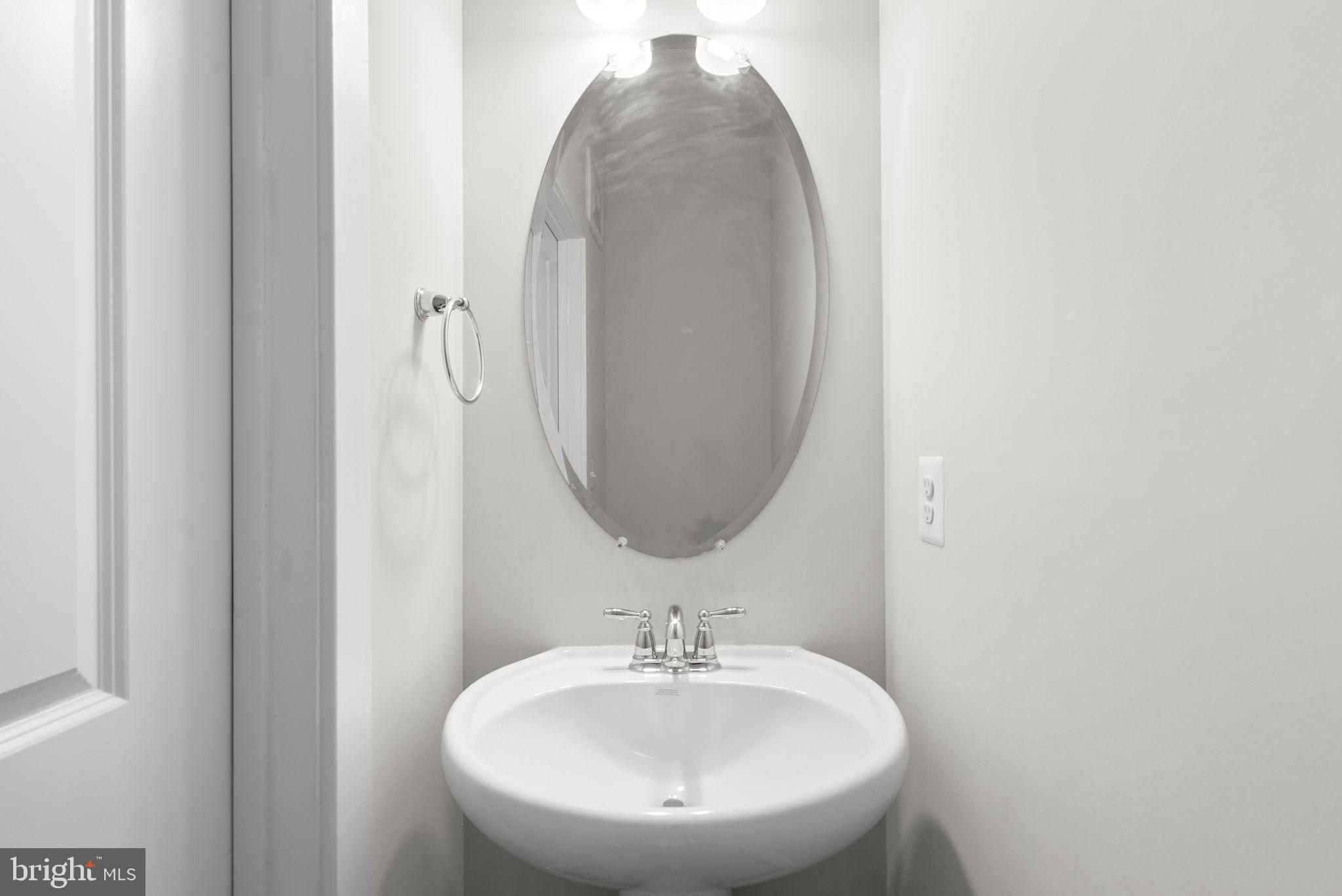 9610 Fields Road, Unit 9610 Gaithersburg, MD 20878 - Photo 13 of 29 Hallway Half Bath