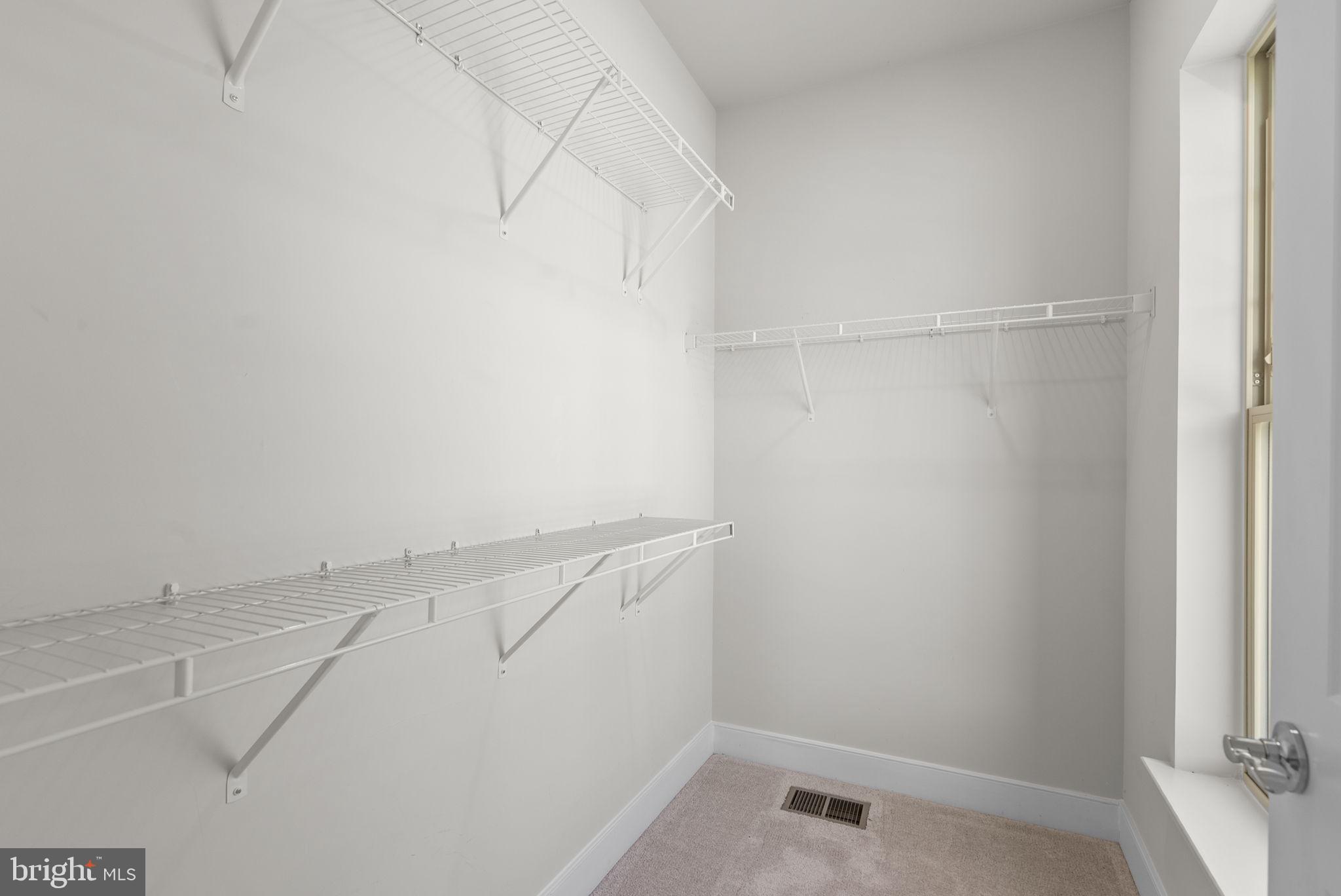 9610 Fields Road, Unit 9610 Gaithersburg, MD 20878 - Photo 17 of 29 Primary Walk-In Closet