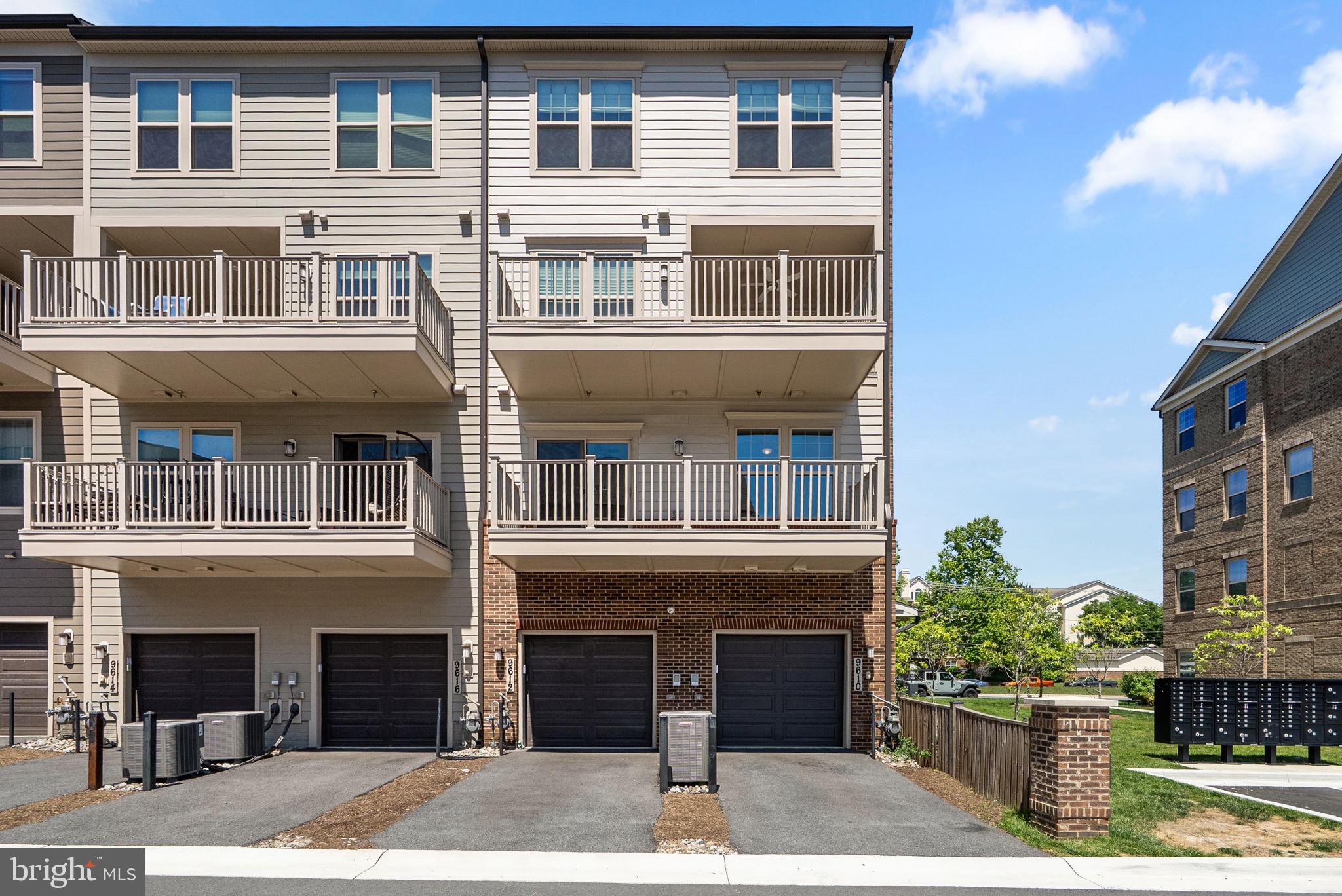 9610 Fields Road, Unit 9610 Gaithersburg, MD 20878 - Photo 27 of 29 Rear of Building w/ Private Garage Access
