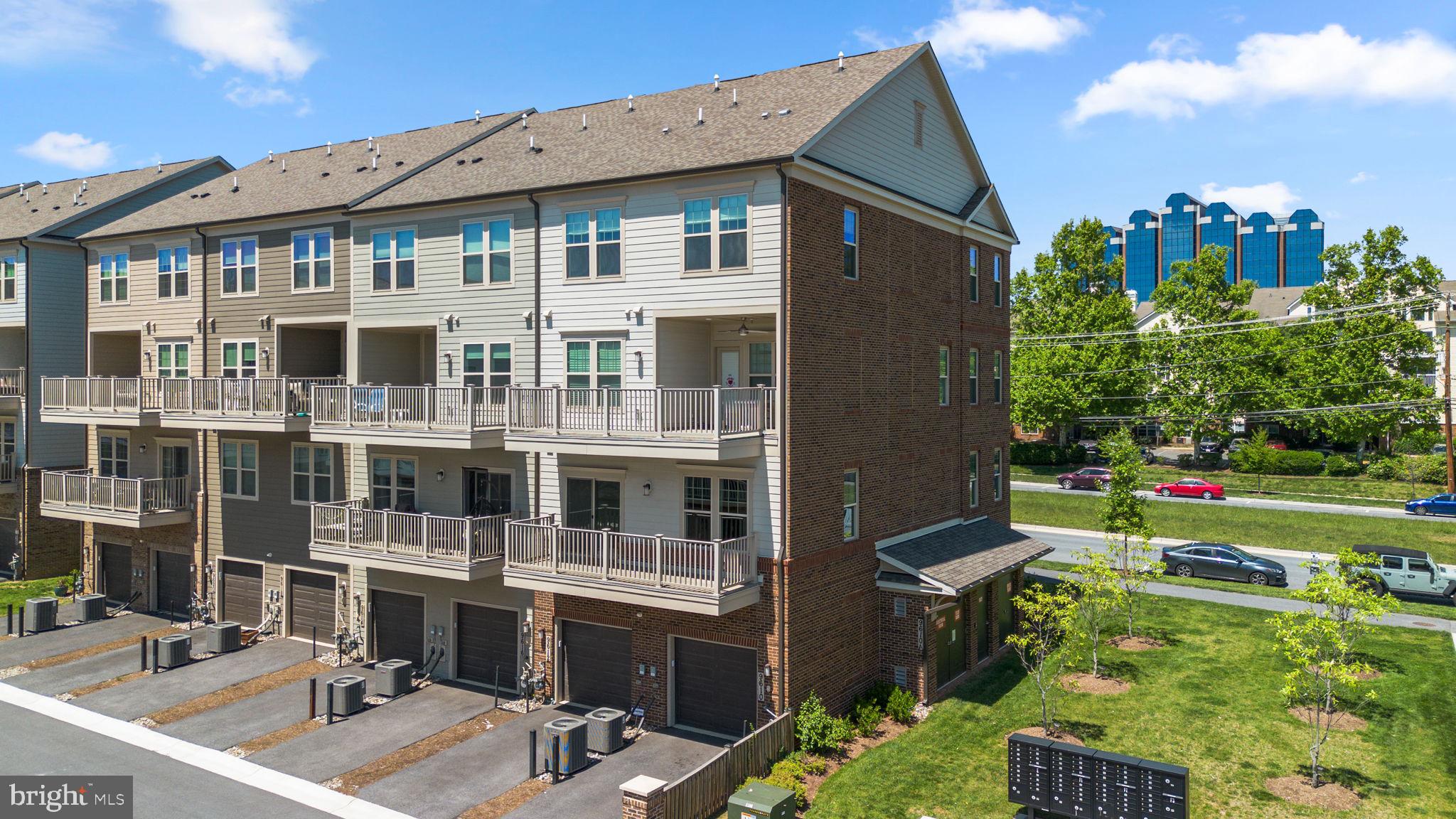 9610 Fields Road, Unit 9610 Gaithersburg, MD 20878 - Photo 28 of 29 Rear of Building w/ Private Garage Access