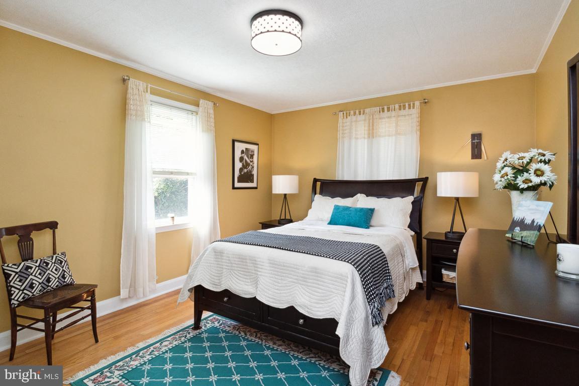 2903 Church Road Parkville, MD 21234 - Photo 12 of 37 a bedroom with a bed and wooden floor