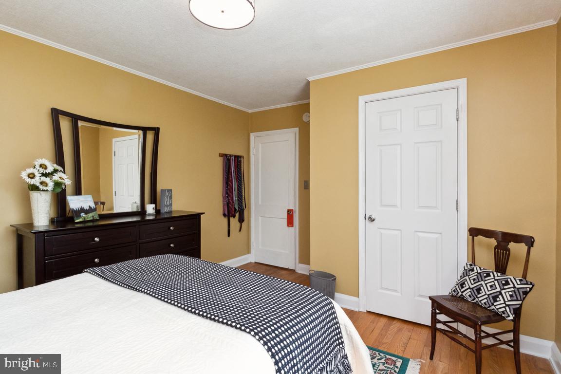 2903 Church Road Parkville, MD 21234 - Photo 13 of 37 a bedroom with a bed and a dresser in it