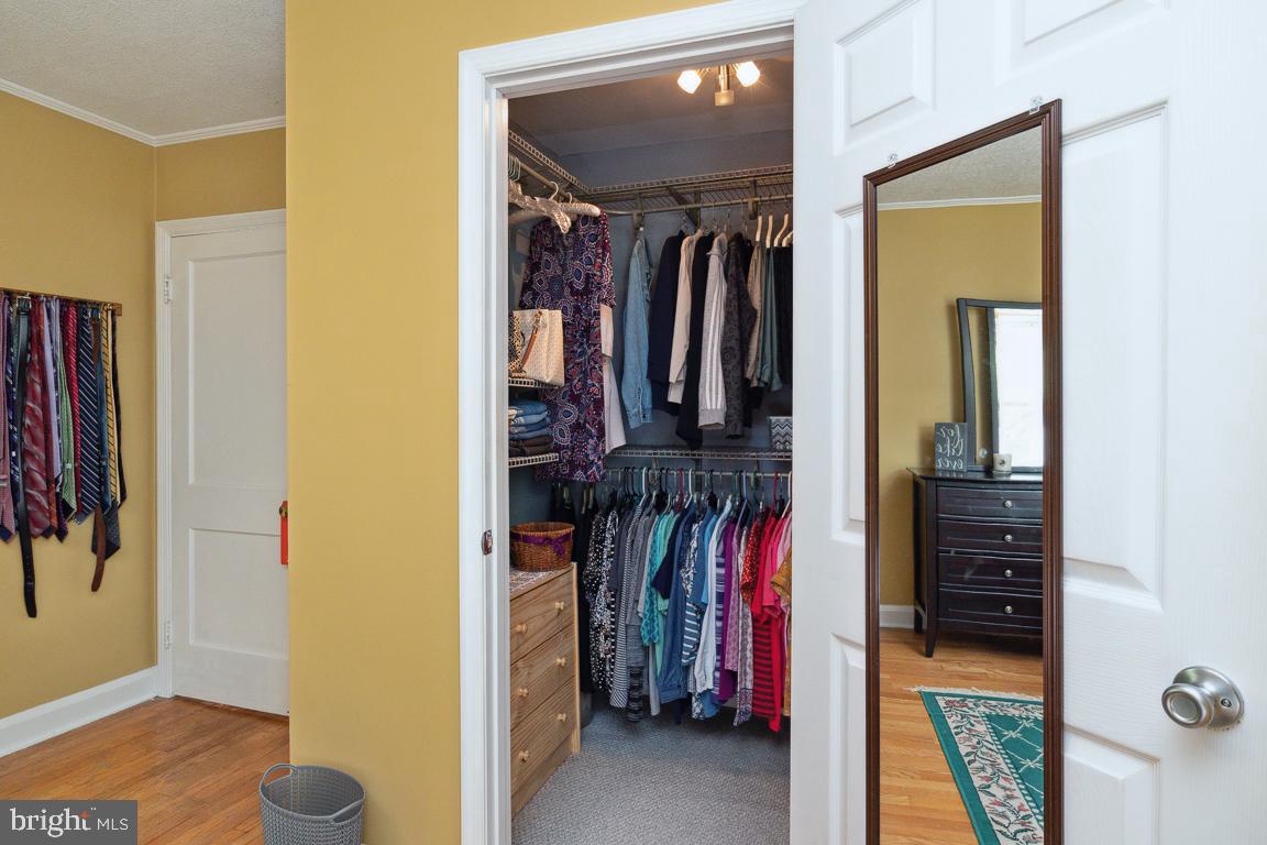 2903 Church Road Parkville, MD 21234 - Photo 14 of 37 a view of walk in closet with clothes and shoes