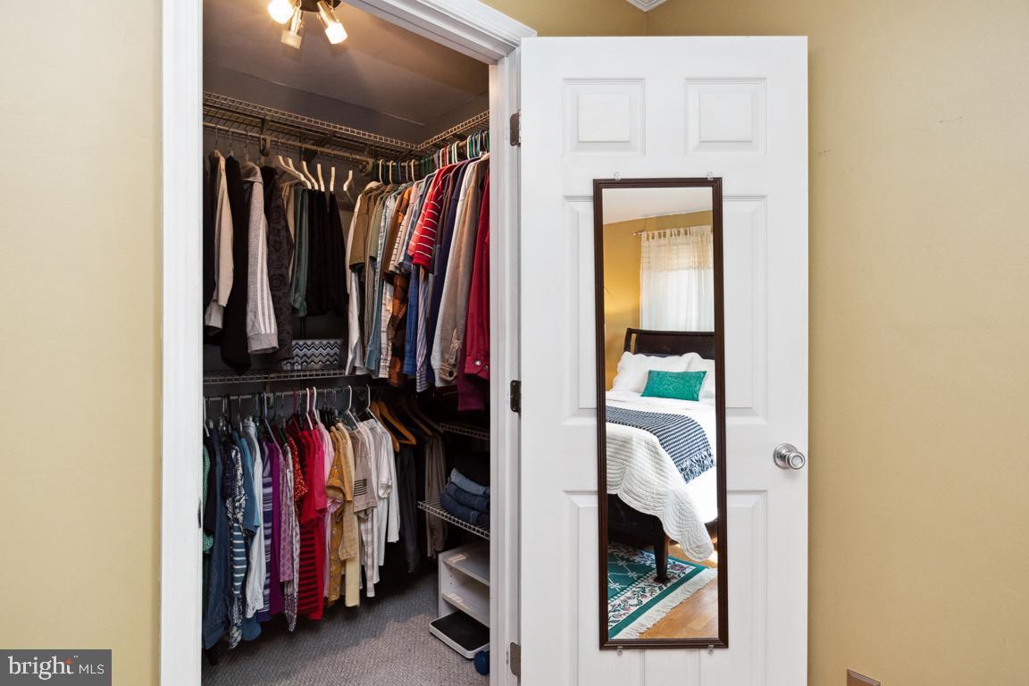2903 Church Road Parkville, MD 21234 - Photo 16 of 37 a view of walk in closet with clothes and shoes