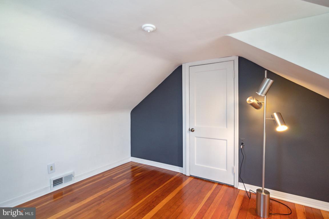 2903 Church Road Parkville, MD 21234 - Photo 21 of 37 a view of empty room with wooden floor and fan