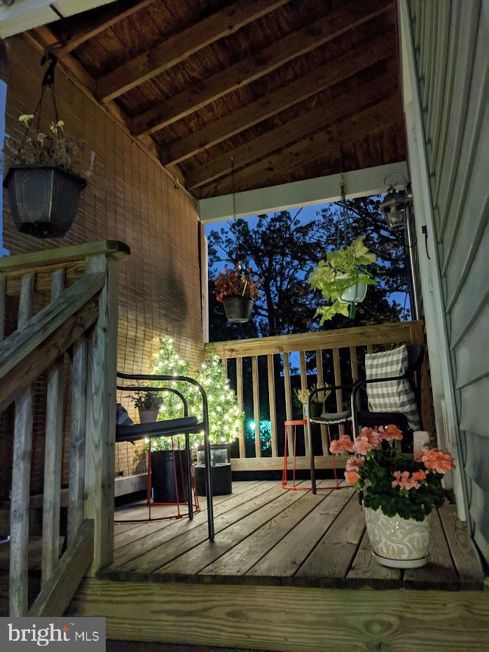 2903 Church Road Parkville, MD 21234 - Photo 37 of 37 a view of a porch with furniture and floor to ceiling window
