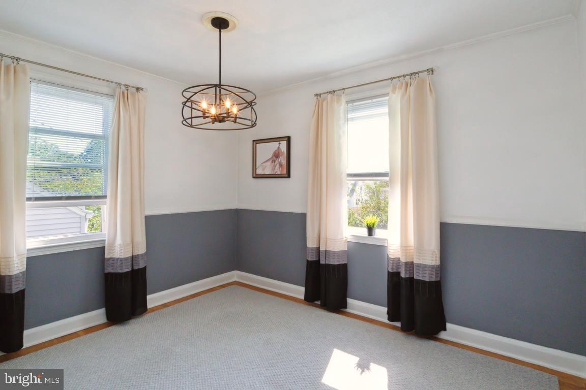 2903 Church Road Parkville, MD 21234 - Photo 10 of 37 a view of wooden floor and a chandelier in a room