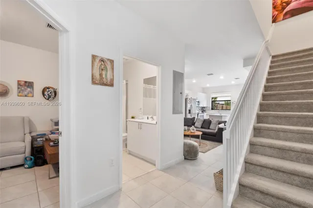 a view of a living room and workspace