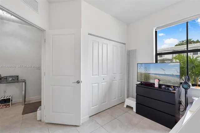 a room with furniture and a gate