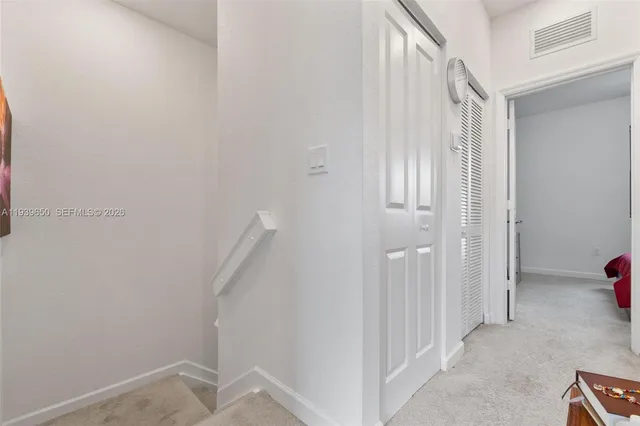 a view of entryway with stairs