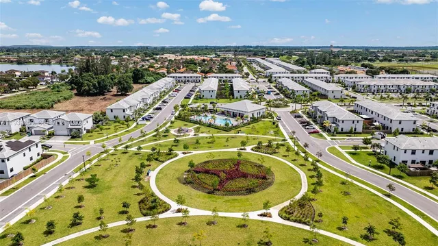 an aerial view of a swimming pool with outdoor space