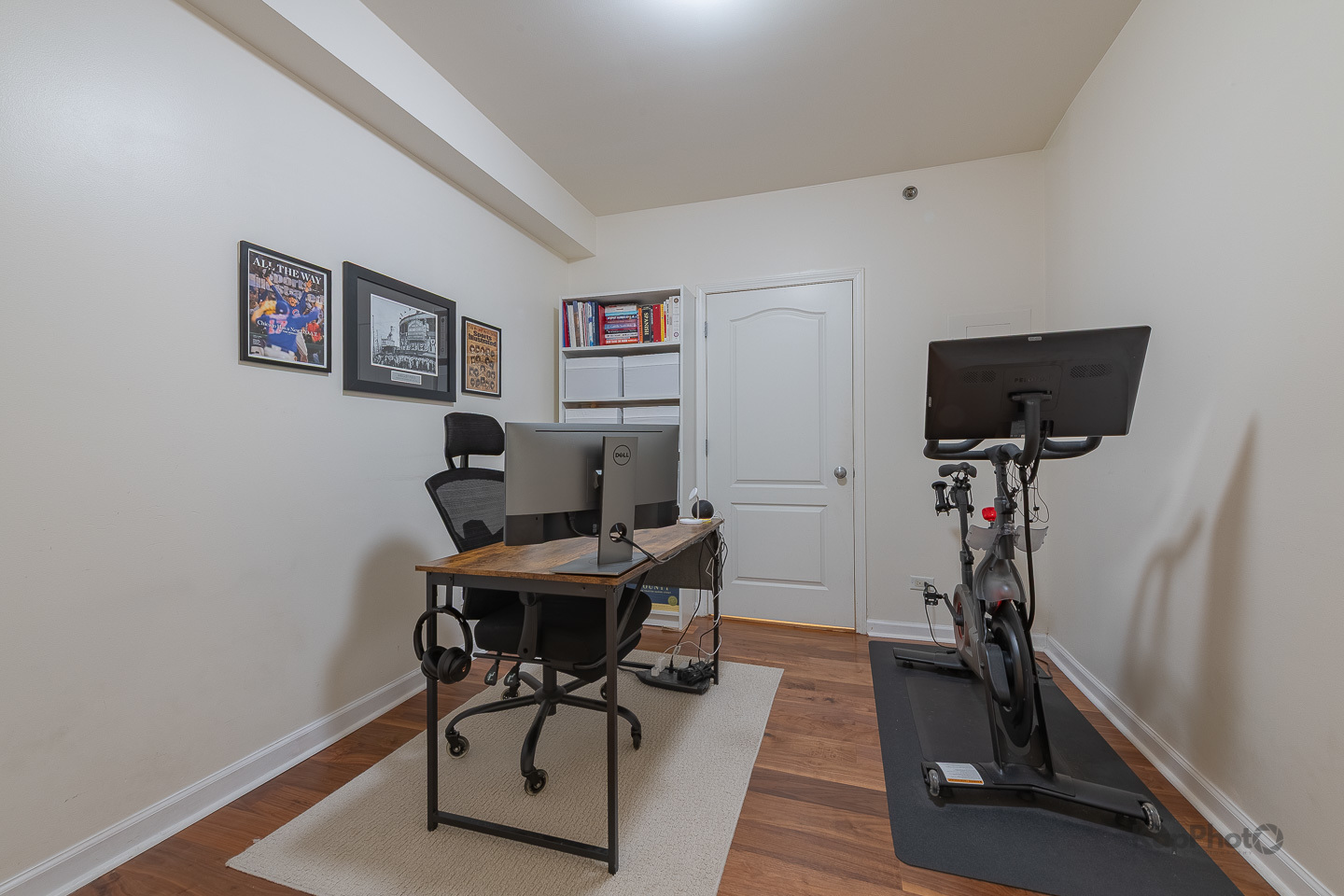 1212 North Wells Street, Unit 303 Chicago, IL 60610 - Photo 16 of 22 a view of a workspace with furniture and gym equipment