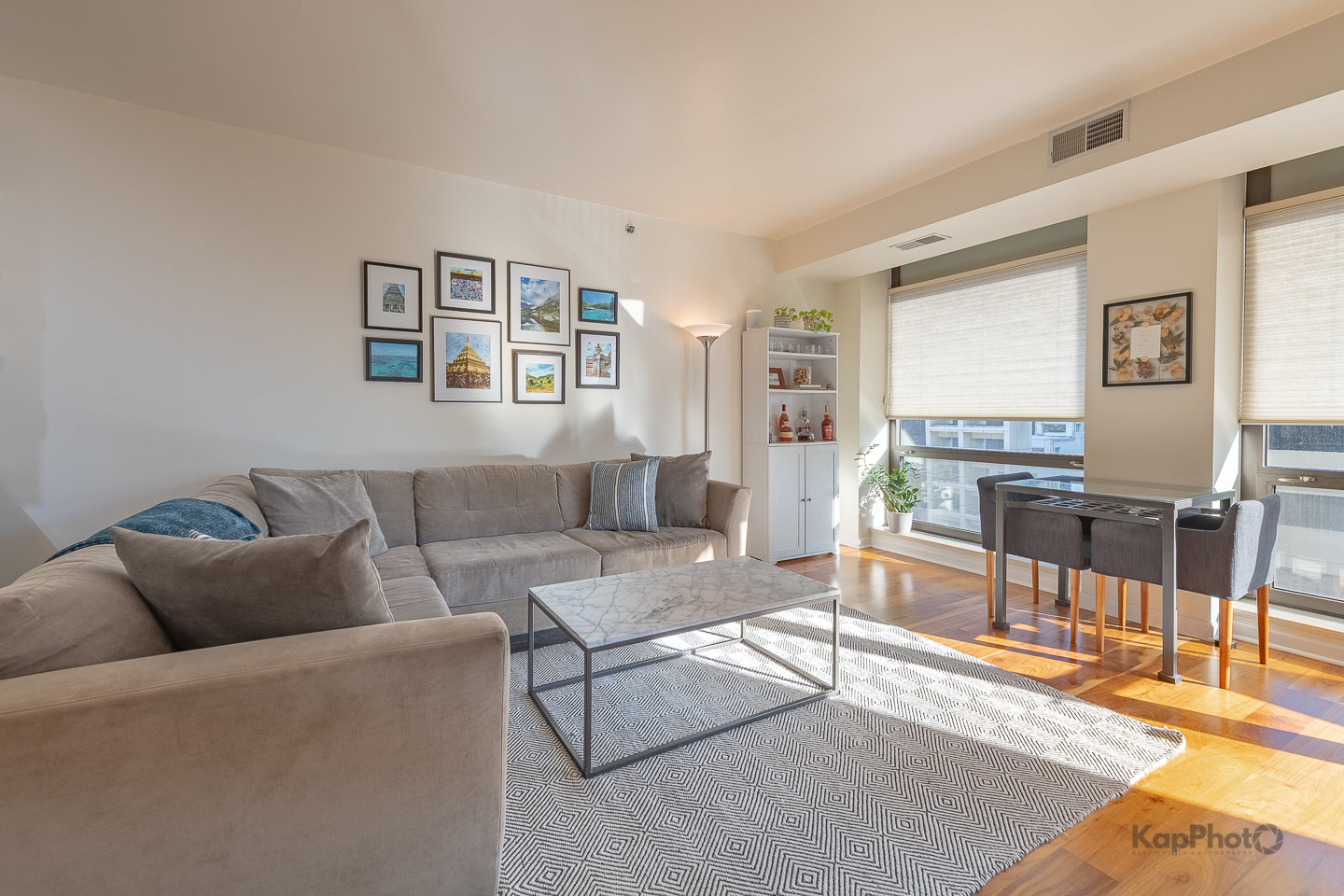 1212 North Wells Street, Unit 303 Chicago, IL 60610 - Photo 8 of 22 a living room with furniture and a table
