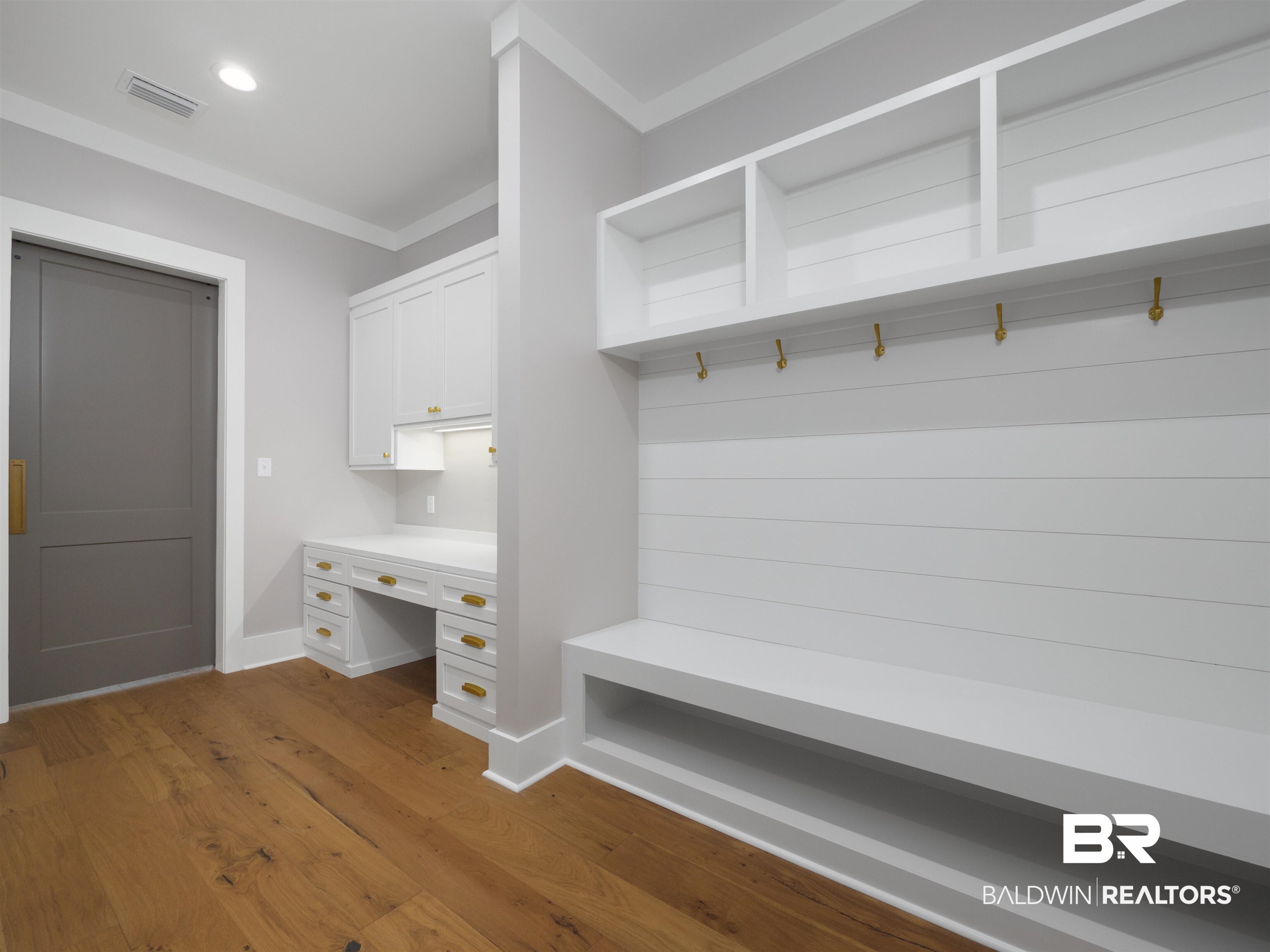 10912 Catania Avenue Fairhope, AL 36532 - Photo 27 of 54 This area of the home features storage built-ins, a desk area, and a mud nook