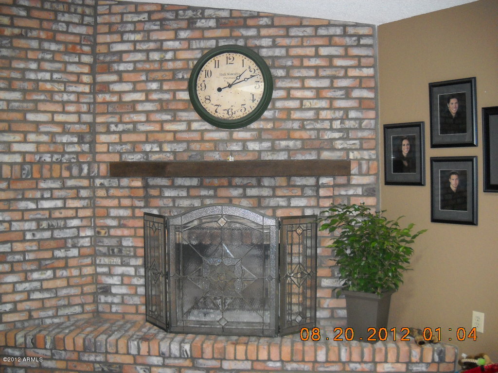 156 West Wagoner Road Phoenix, AZ 85023 - Photo 14 of 36 Family room fireplace