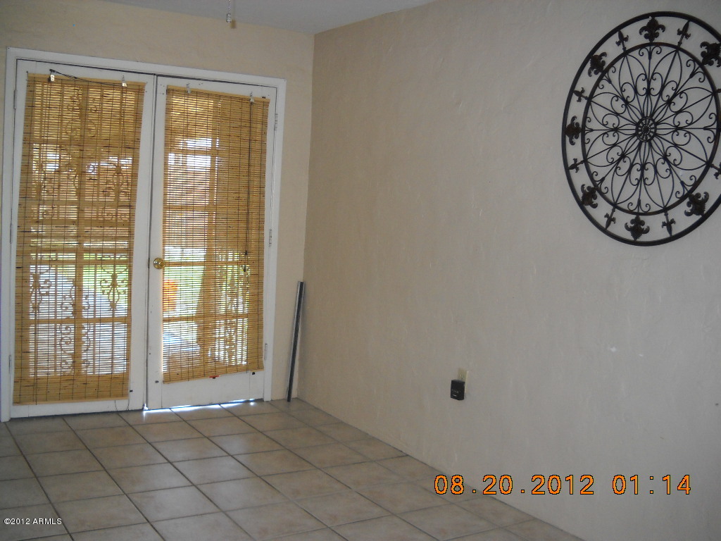 156 West Wagoner Road Phoenix, AZ 85023 - Photo 17 of 36 Bonus room French doors to patio