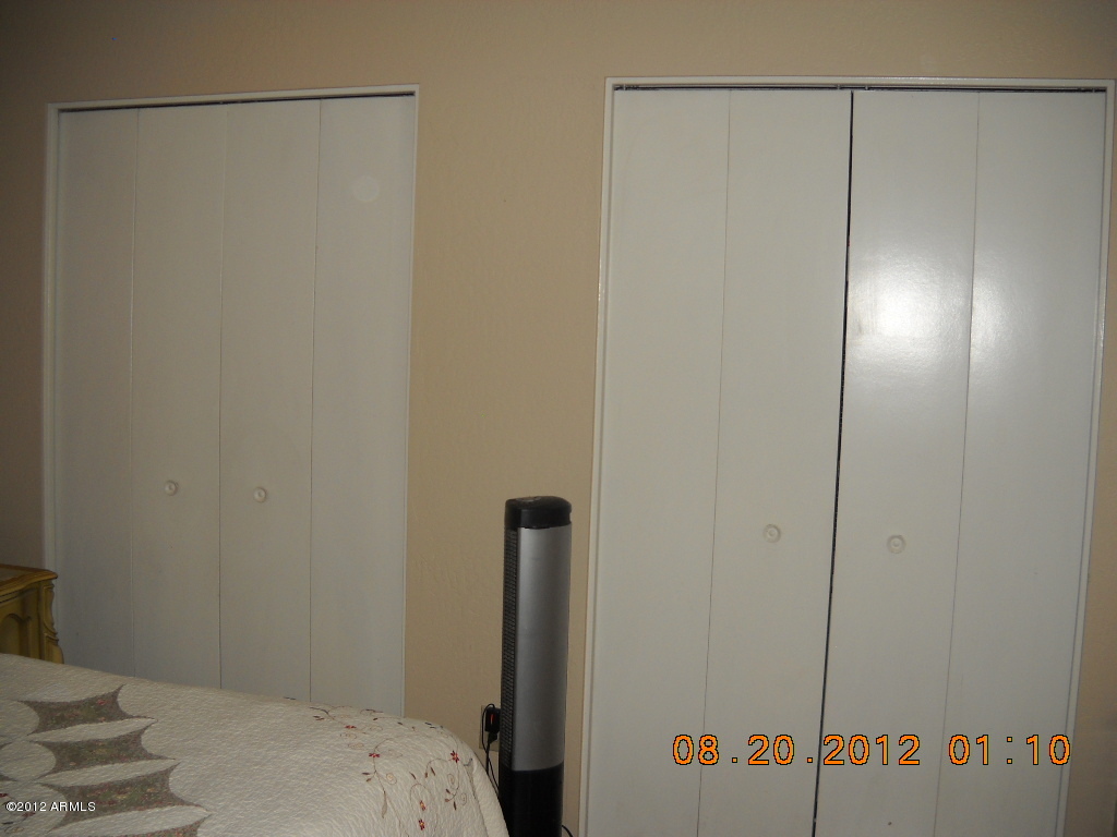 156 West Wagoner Road Phoenix, AZ 85023 - Photo 22 of 36 Master BR wall of closets