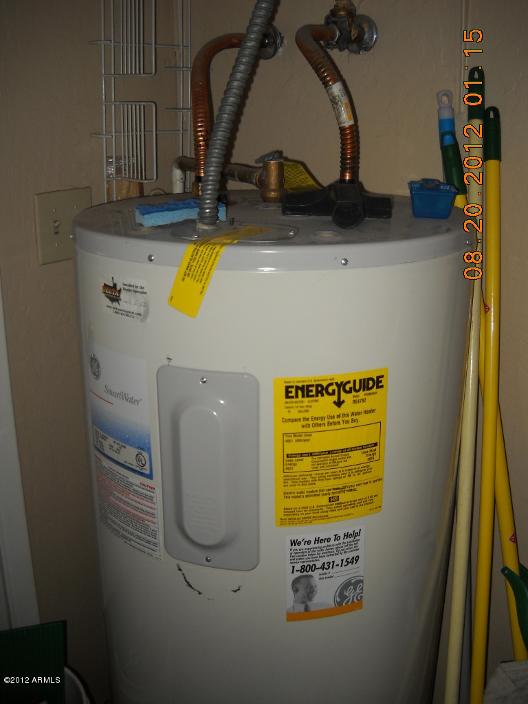 156 West Wagoner Road Phoenix, AZ 85023 - Photo 27 of 36 Water heater in laundry room