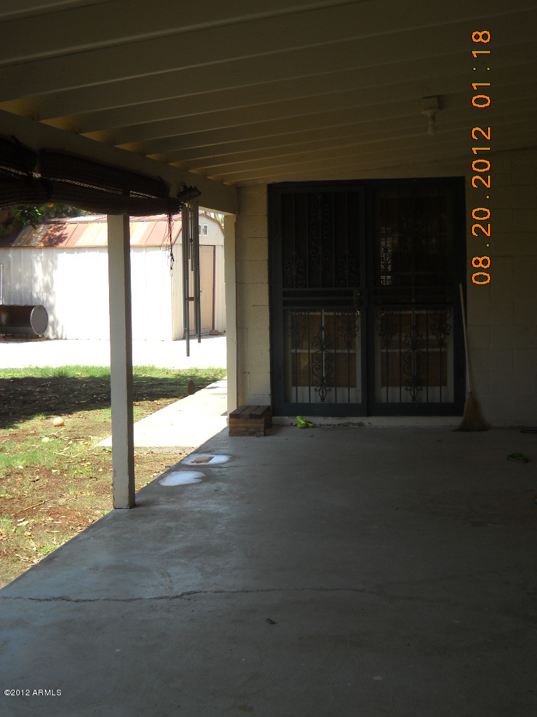156 West Wagoner Road Phoenix, AZ 85023 - Photo 28 of 36 Extra long covered patio