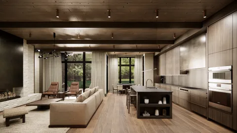 a living room with stainless steel appliances kitchen island granite countertop furniture and a large window