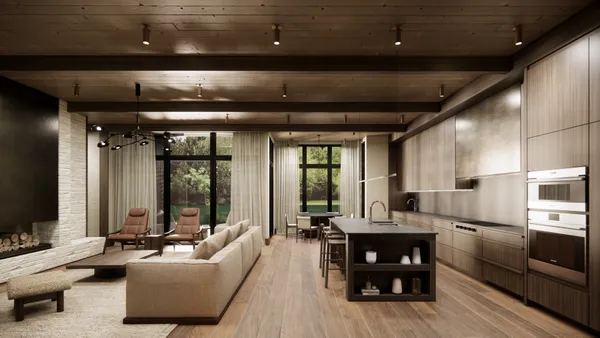 a living room with stainless steel appliances kitchen island granite countertop furniture and a large window