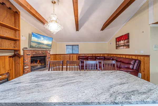 a view of livingroom with furniture and fireplace