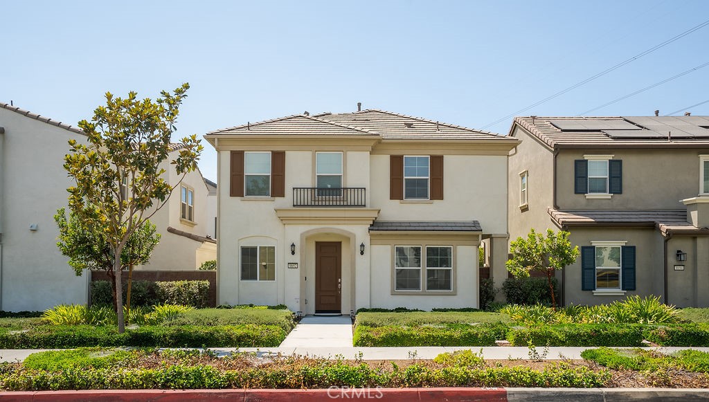 8692 Autumn Path Street Chino, CA 91708 - Photo 1 of 1 a front view of a house with a yard
