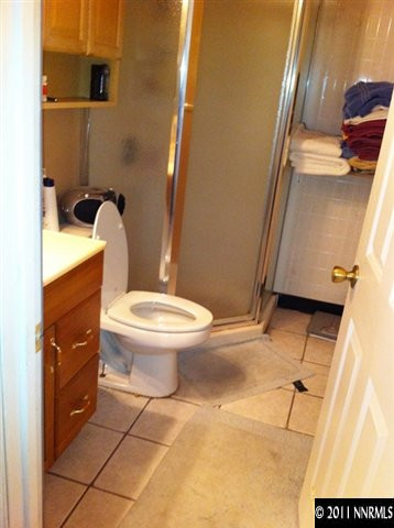 3660 Renee Way Reno, NV 89503 - Photo 4 of 6 a bathroom with a toilet and a shower
