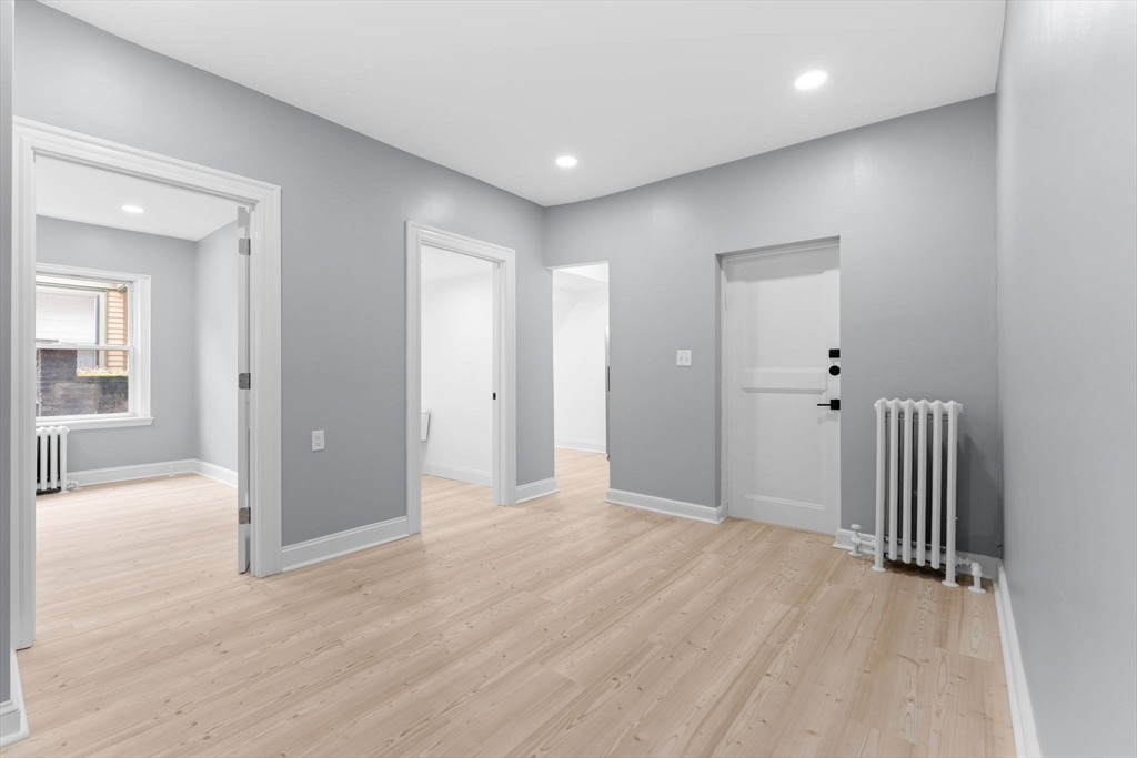 127 Winthrop Road, Unit 12A Brookline, MA 02445 - Photo 3 of 41 wooden floor with a window