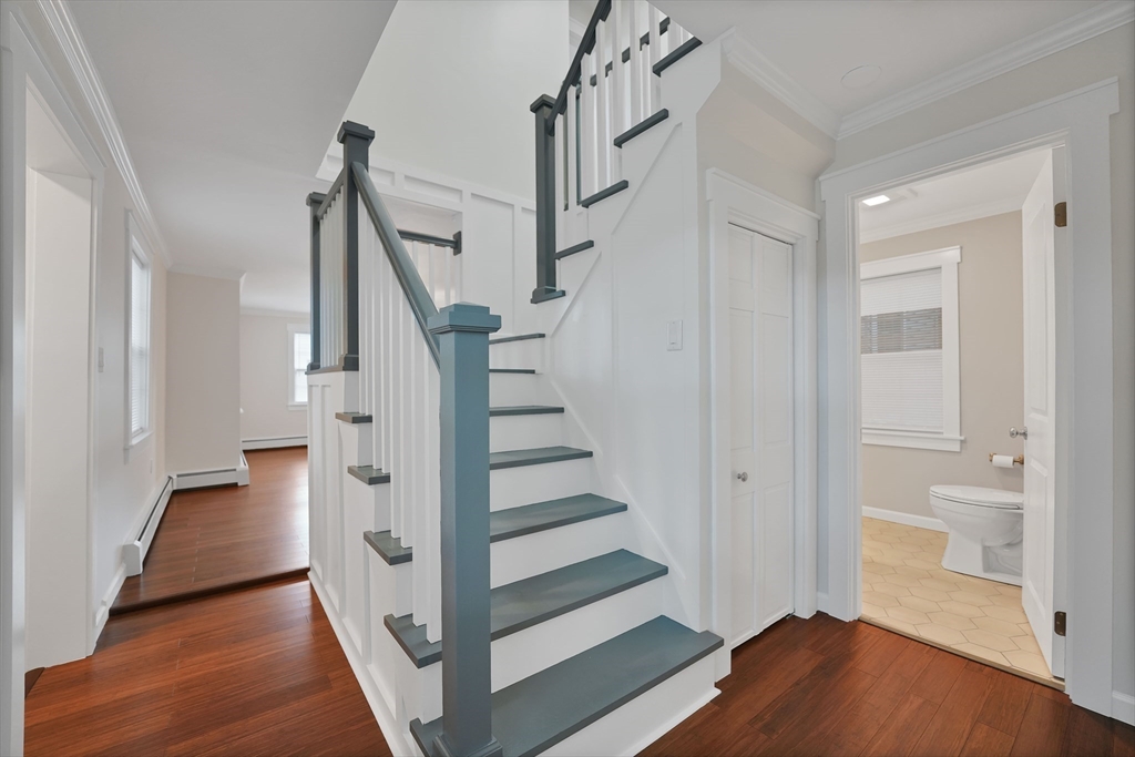 245 Wareham Road Marion, MA 02738 - Photo 17 of 42 a view of entryway with wooden floor and stairs